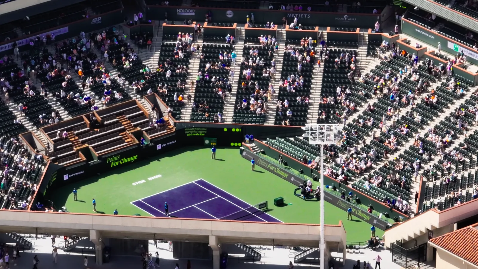 High wide view over a stadium tennis court