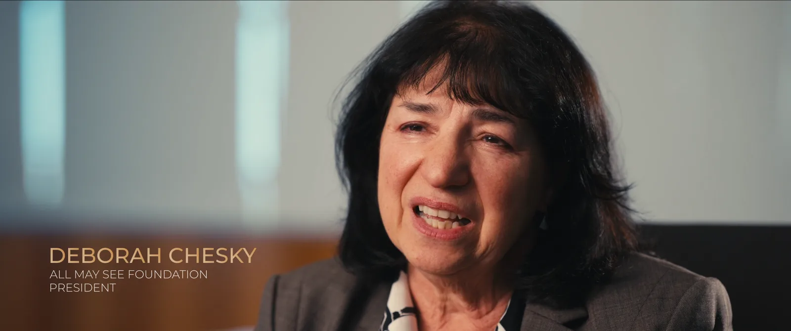 Documentary interview with a lower-third title